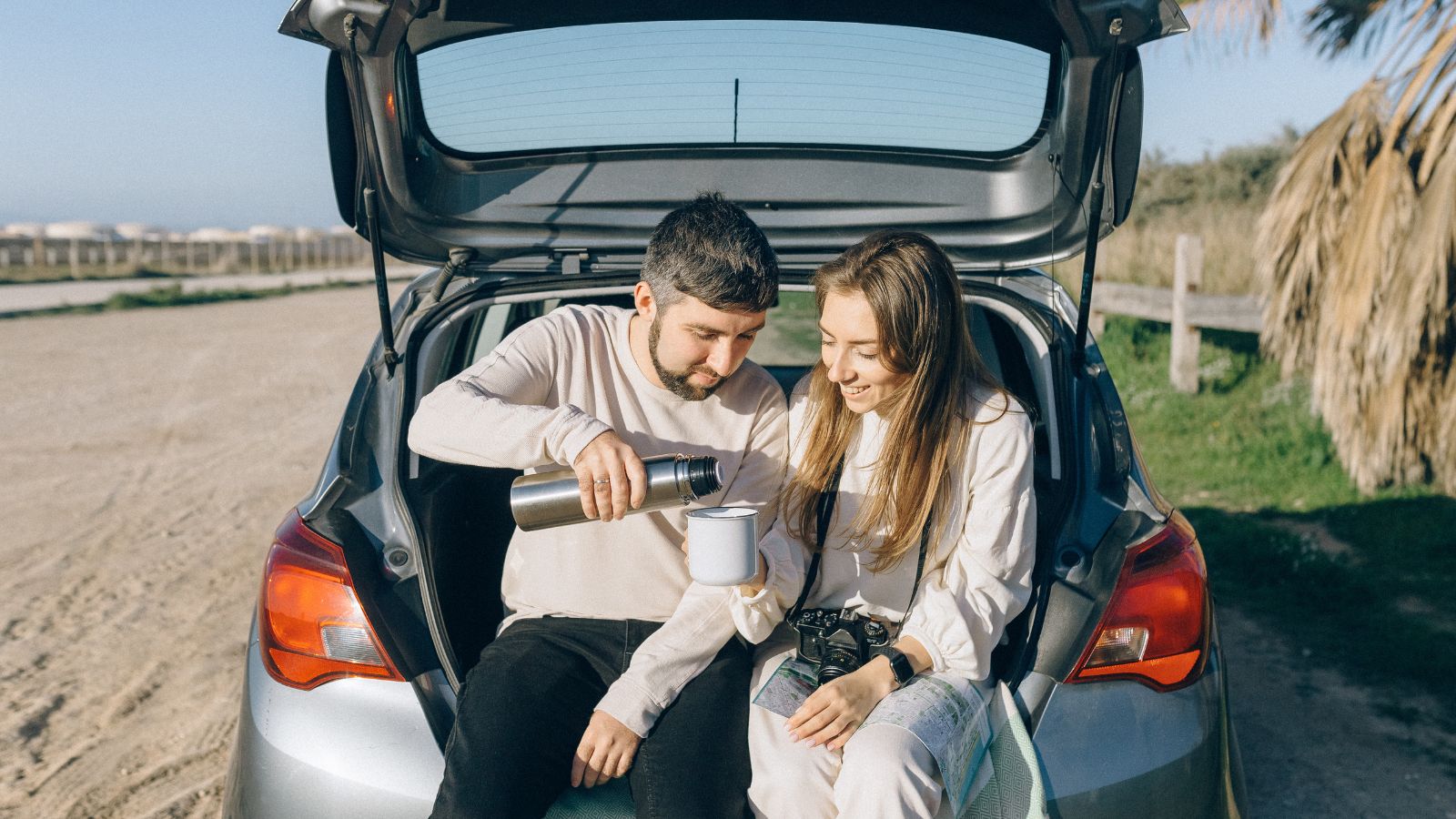 Car on a New Zealand road representing car loan repayments in NZ