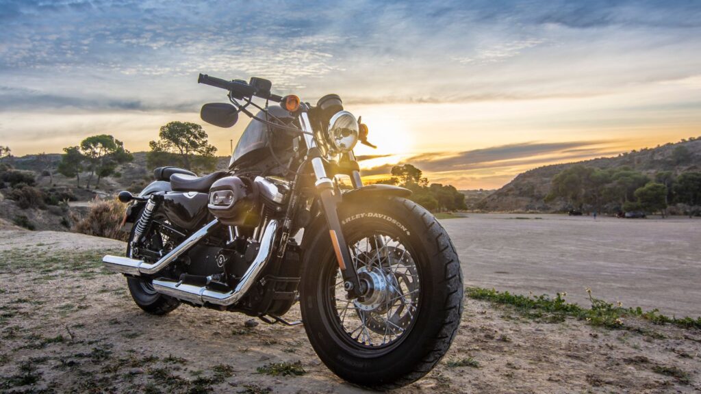 Motorbike and caravan representing leisure finance options in New Zealand