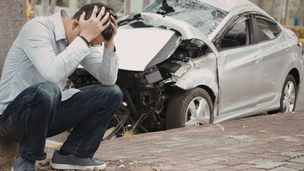 New Zealand car owner reviewing an insurance settlement and outstanding car finance